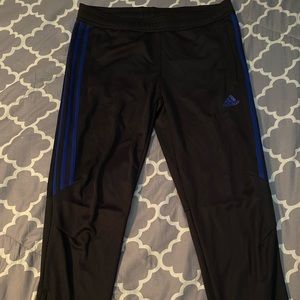 Adidas black sweatpants with blue trimming